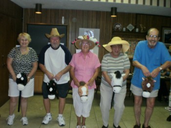 Sebring Elks #1529 enjoyed the Kentucky Derby.  They had several races of their own prior to the main event.  Pictured are the Elks Horses:  Dianna Kuen (Too Slow), George Quel (Cracker), Heide Stover (Why Not), Darlene Quel (May Be), & Dick Stover (Whiner).  Several of the women wore beautiful hats which added to the festivities.